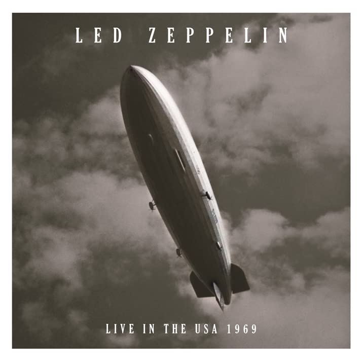 Led Zeppelin album cover: a vintage airship against cloudy sky.