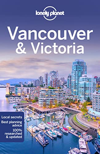 Lonely Planet Vancouver & Victoria travel guide book cover featuring a city skyline and marina.