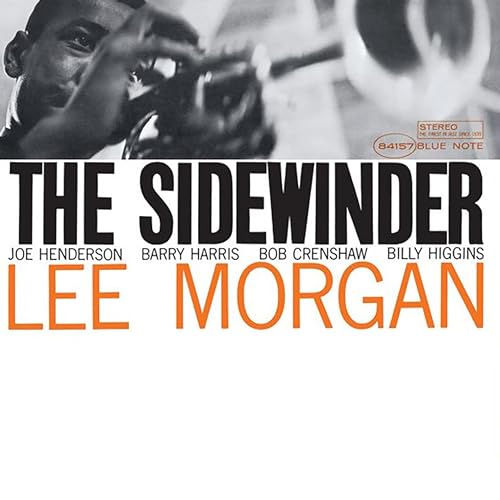 Black and white photo of Lee Morgan playing trumpet on The Sidewinder album cover.