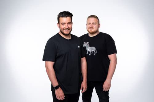 Two men in black shirts with a donkey logo stand smiling.