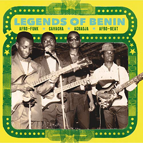 Black and white photo of four musicians with guitars, album cover.