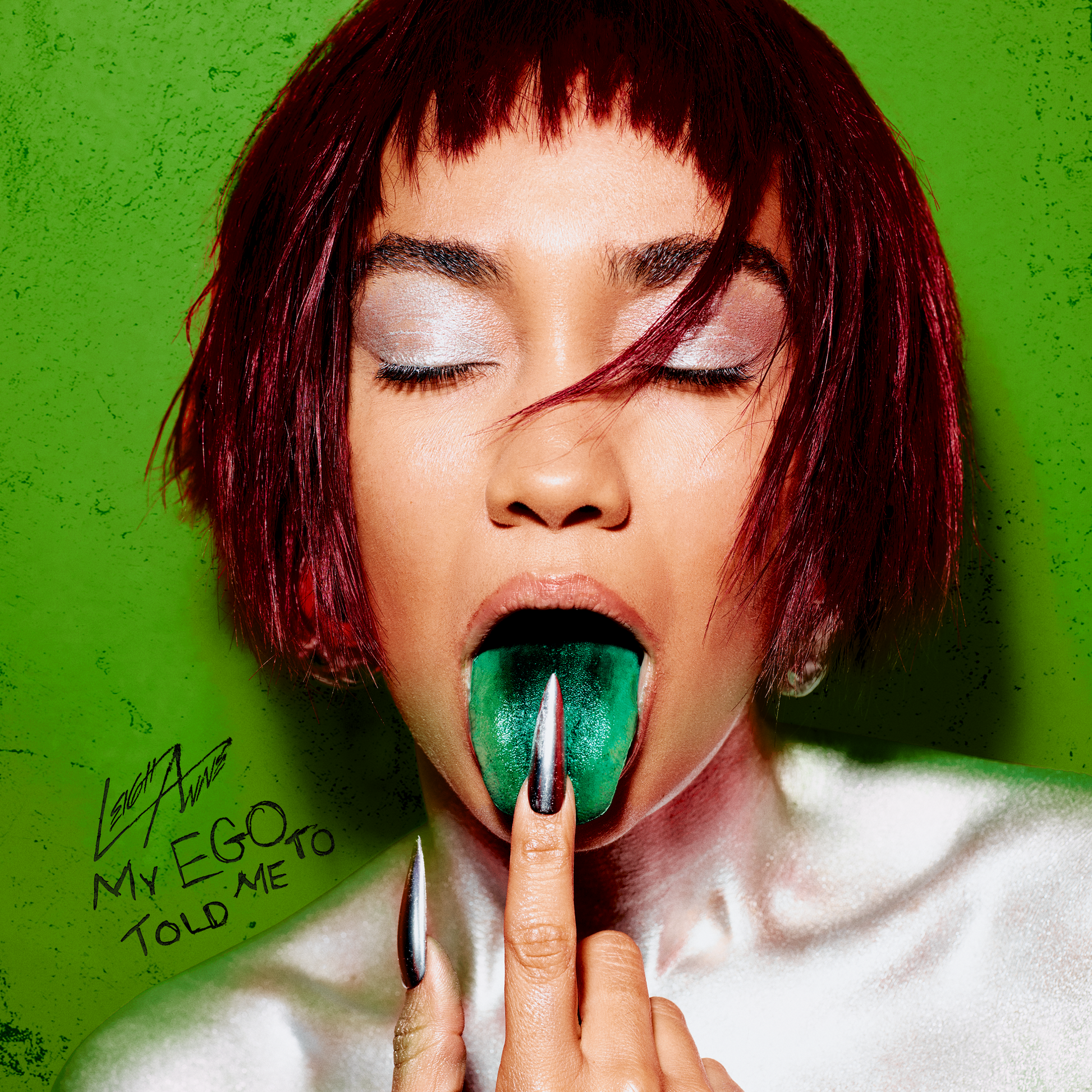 Leigh-Anne album cover: woman with red hair, green background, open mouth.