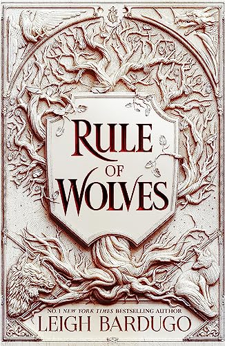 Book cover: ornate frame with wolves, shield shape, and title "Rule of Wolves".