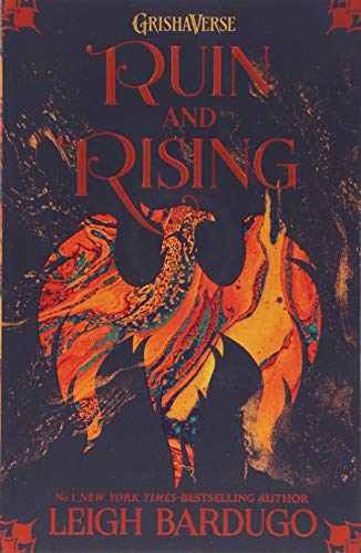Book cover: “Ruin and Rising” with a fiery phoenix and gold text.
