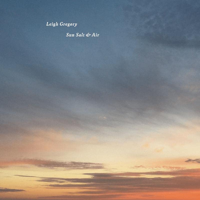 Album cover for Leigh Gregory’s “Sun Salt & Air” with a cloudy sky.