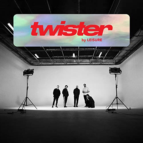 Five band members stand in a white studio with lighting equipment under a title banner.