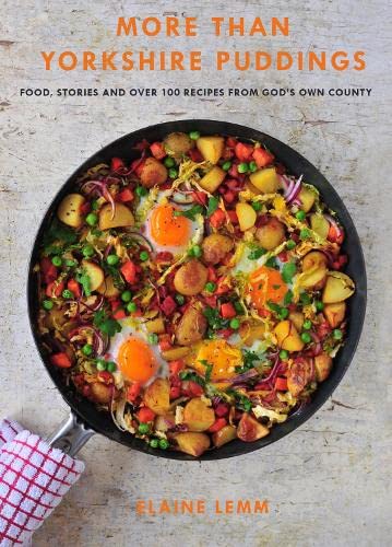Cookbook cover featuring a pan of fried eggs, potatoes, and vegetables.