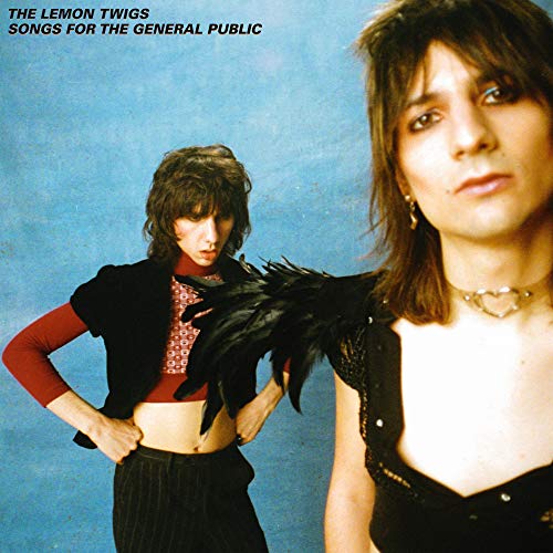 CD cover featuring two people with dark hair against a blue background.