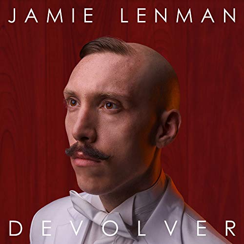 Jamie Lenman album cover, "Devolver", featuring a portrait against red drapery.