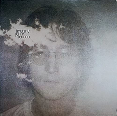 Close-up of John Lennon’s “Imagine” album cover, grainy and atmospheric.