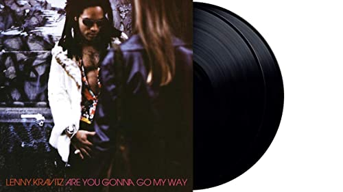 Lenny Kravitz album cover with a vinyl record beside it.