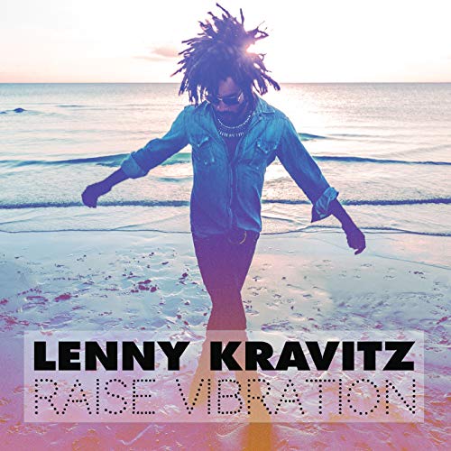 "Lenny Kravitz album cover with man walking on beach, text overlay."