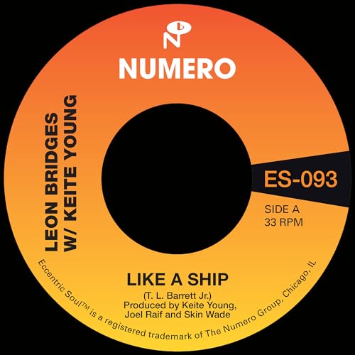 Orange and black vinyl record label with “Like A Ship” text.