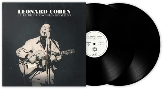 Leonard Cohen vinyl record with album cover featuring him singing.