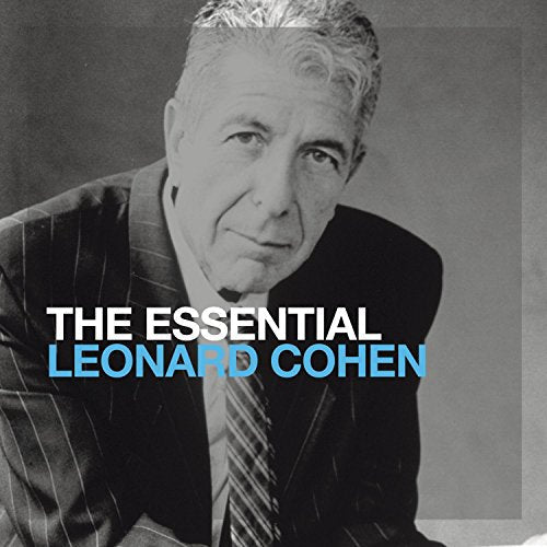 Black and white portrait of Leonard Cohen wearing a suit and tie.