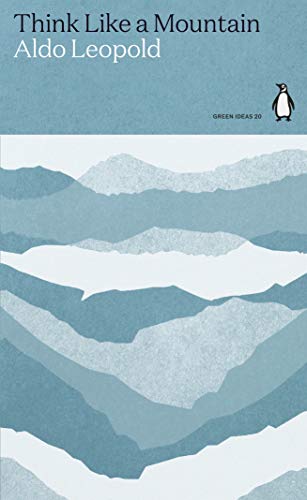 Book cover with blue mountain illustration and a penguin logo.