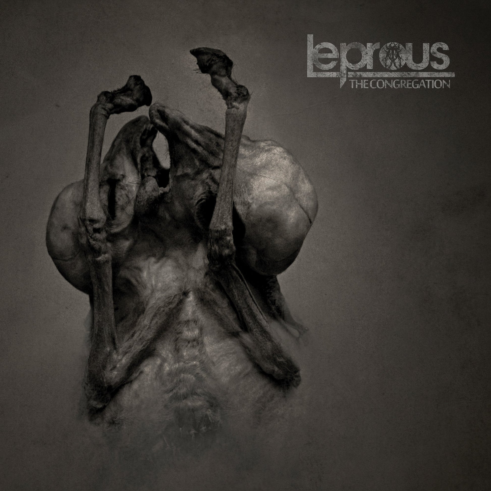 Black and white album cover featuring a skeletal, distorted human figure.