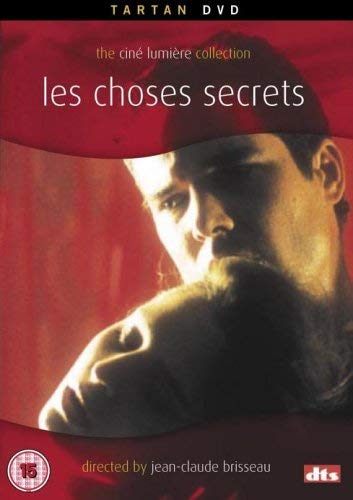 DVD cover for "Les Choses Secrets" featuring a close-up of a man’s face.