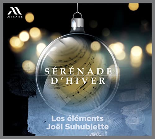 CD cover with a glass ornament containing sheet music and text.