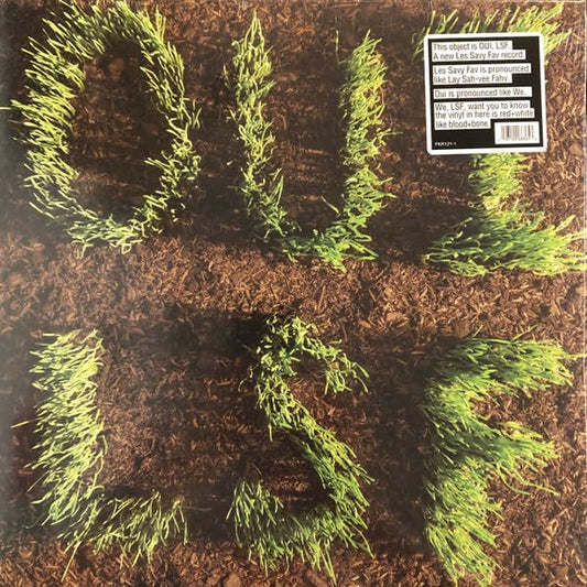 Vinyl cover with green grass spelling OUI LSF on brown soil and text sticker.