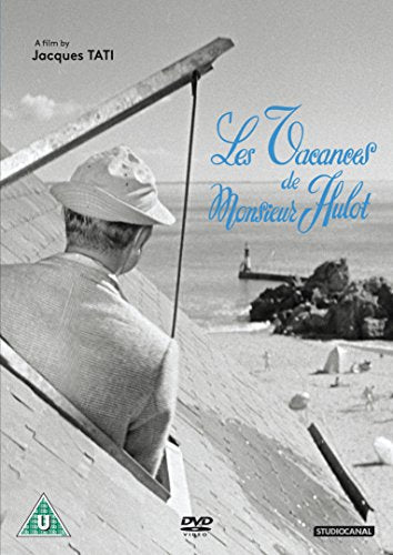 DVD cover featuring a man in a hat on a beach with a body of water.