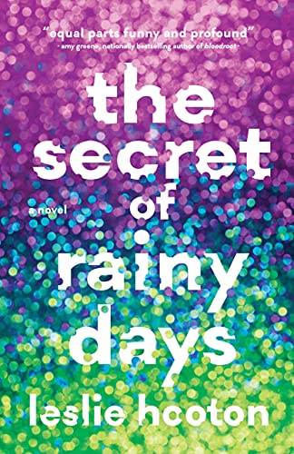 Book cover: "The Secret of Rainy Days" with glittery, colorful background.