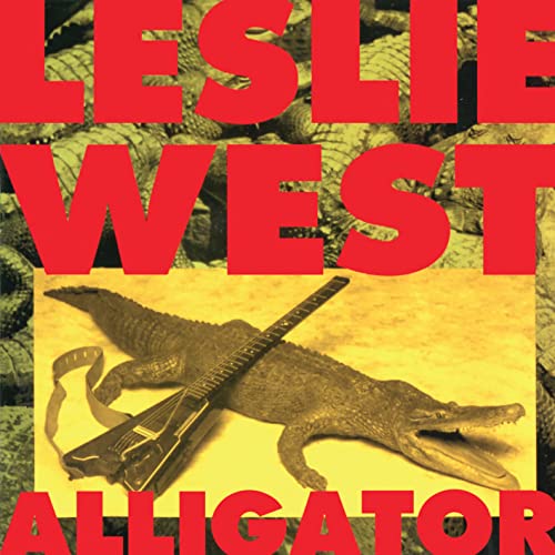 Album cover for Leslie West’s “Alligator” featuring alligators and a guitar.
