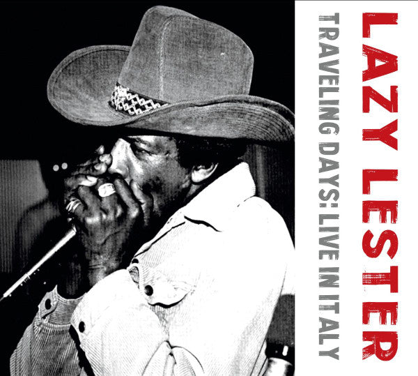 Black and white portrait of blues musician Lazy Lester with a harmonica.