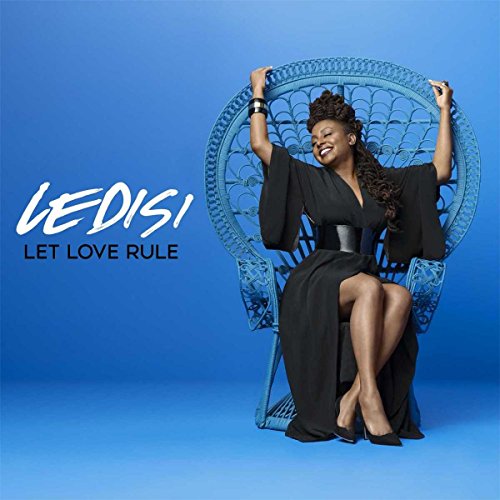 Ledeshi album cover: woman in black dress seated in a blue chair.