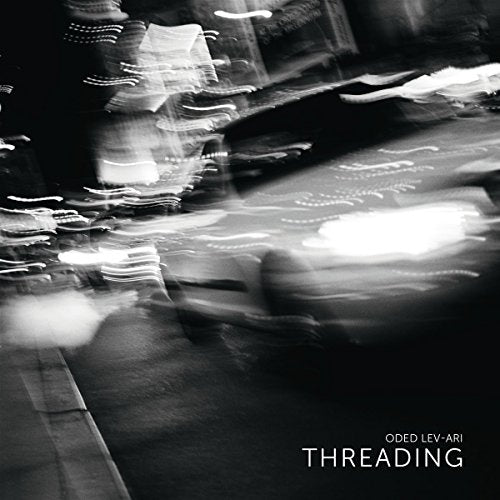 Abstract black and white motion blur CD cover, text reads "Threading".