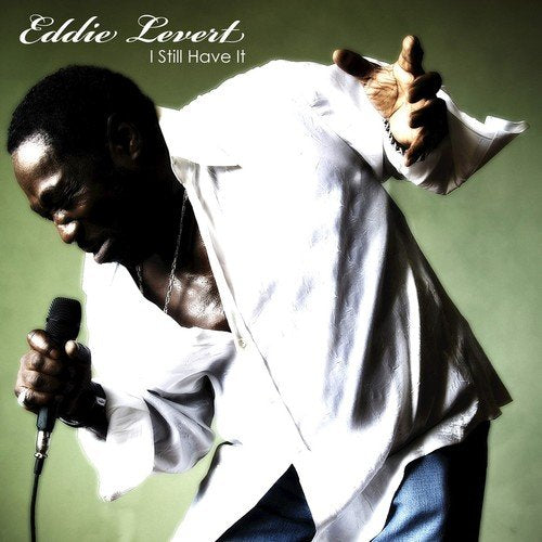 Eddie Levert singing into a microphone, album cover for "I Still Have It".