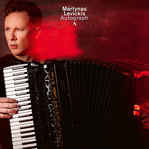 Martynas Levickis holding an accordion, red background, album cover art.
