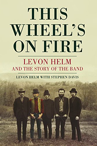 Book cover: "This Wheel's On Fire" with a photo of The Band.