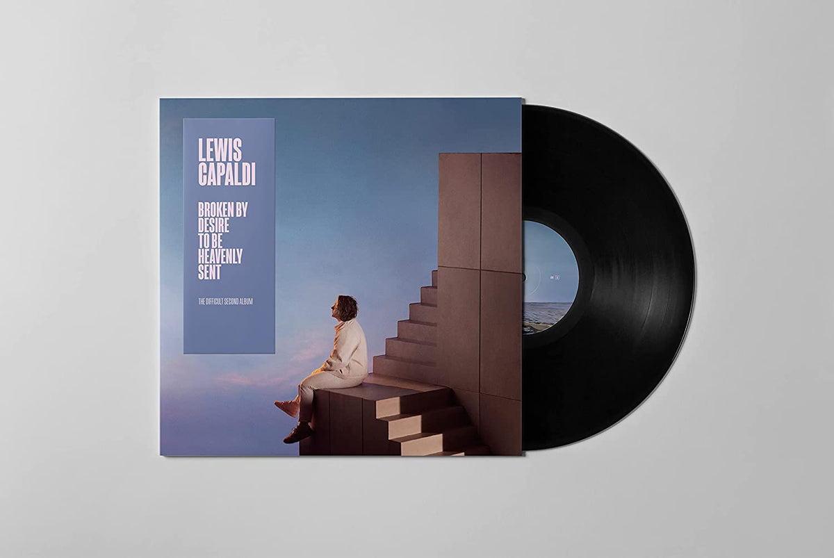 "Vinyl record with cover art featuring a man sitting on a staircase."