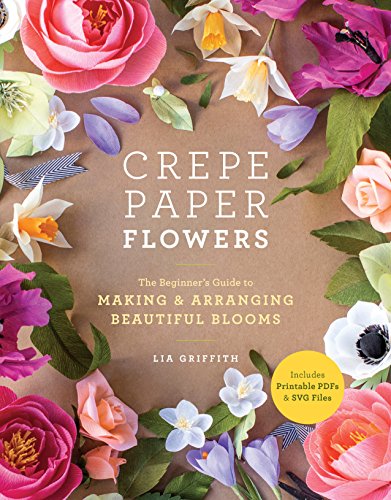 Book cover titled Crepe Paper Flowers surrounded by various handcrafted paper flowers on brown.