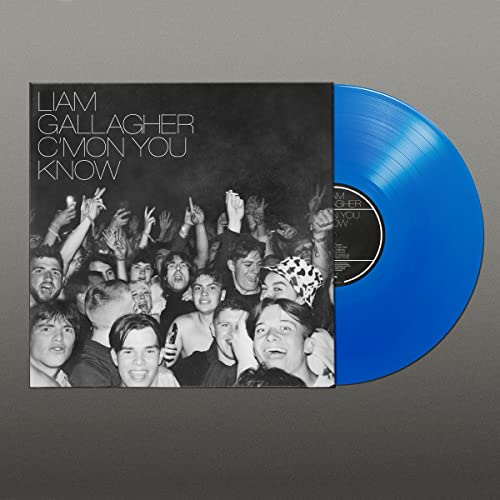 Liam Gallagher C'mon You Know vinyl record cover next to a blue vinyl disc.