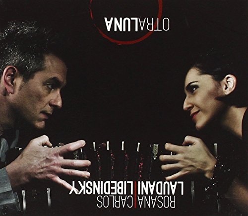CD cover featuring two people facing each other with red text.