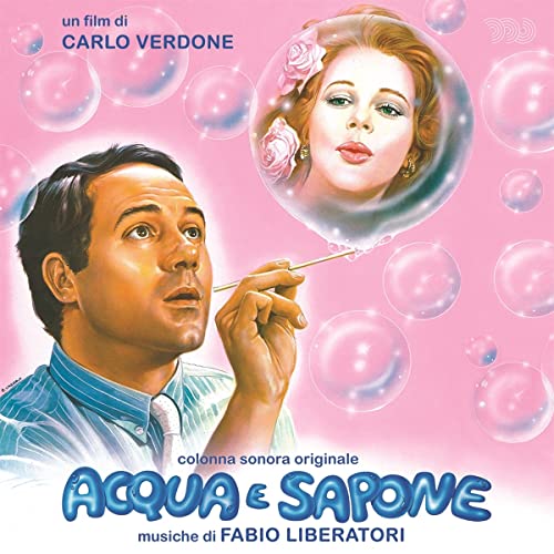 CD cover: man blowing bubbles towards a woman’s portrait in a bubble.