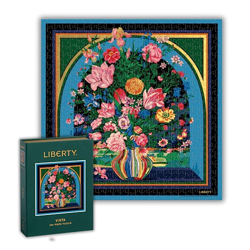 Completed floral jigsaw puzzle with box, featuring a vase of colorful blooms.