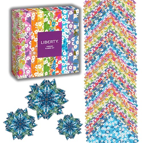 Floral origami kit with patterned paper and finished flower examples.