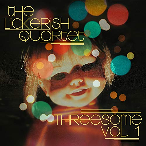 Album cover with a child's face surrounded by colorful bokeh lights.