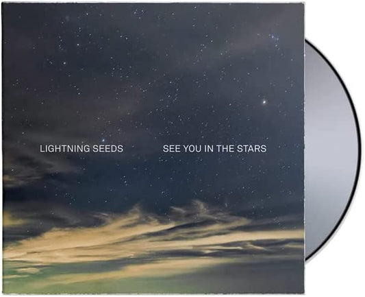 "CD case with starry night sky cover and partially visible silver CD."