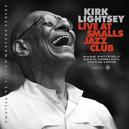 CD cover featuring Kirk Lightsey in black and white, smiling upwards.