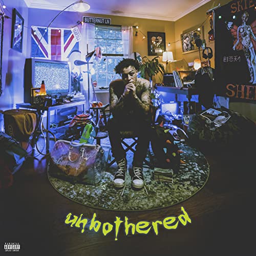 Album cover for Lil Skies’ “Unbothered” featuring a man in a cluttered room.