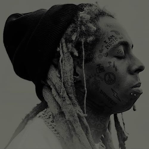 Black and white portrait of Lil Wayne with facial tattoos and dreadlocks.