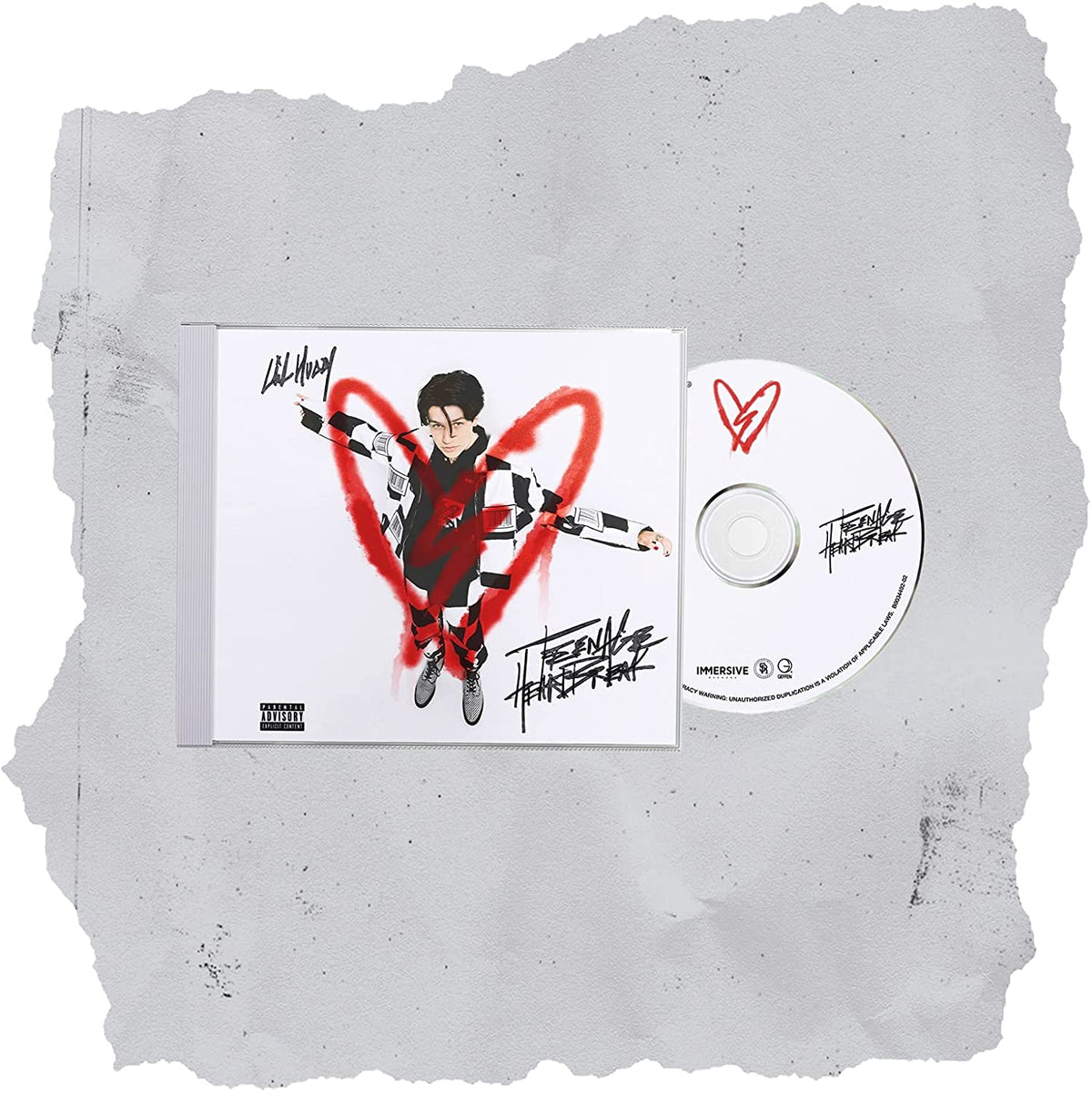 CD case and disc with cartoon man and red heart on grey stone background.