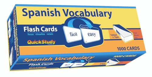 Box of Spanish vocabulary flash cards with English translations shown.