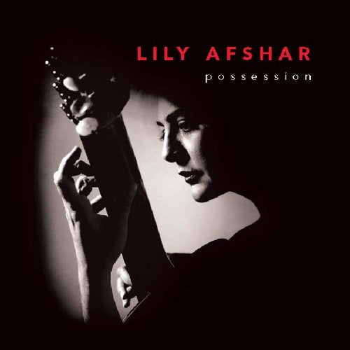 "Lily Afshar's album cover featuring a black-and-white photo of her playing guitar."