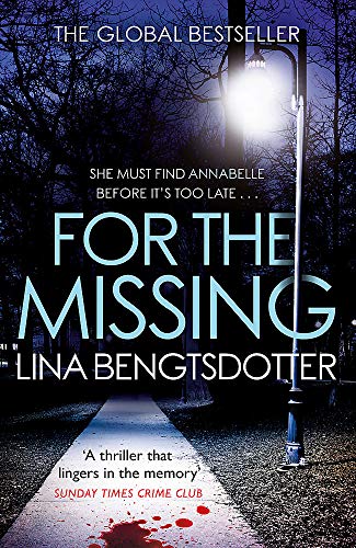 Book cover for For the Missing showing a dark path under a streetlamp.