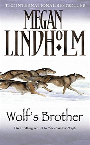 Book cover: wolves running across a snowy landscape, title "Wolf’s Brother".